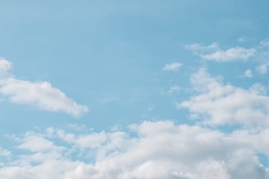 Background of blue sky with beautiful natural white clouds.