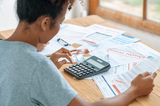 Stressed young woman has financial problems with credit card debt to pay crucial show concept of bad personal money and mortgage pay management crisis. sad and unhappy