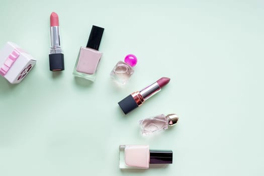 Flat lay for fashion blogger. Woman's glamour makeup beauty products on a white background. nail polishes