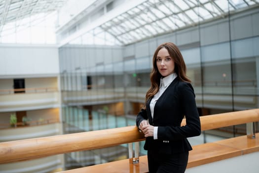 Smiling businesswoman in the office. High quality photo