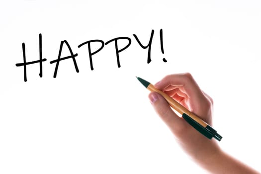 Children hand with pen write on a blue white background. Writing hand. Word HAPPY