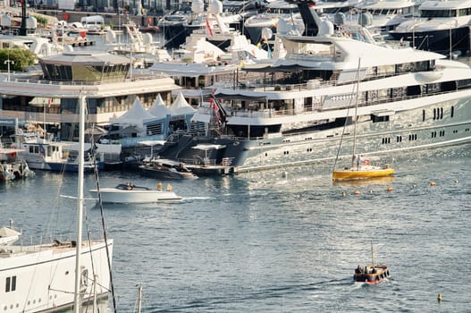 Monaco, Monte Carlo, 01 October 2022 - The famous motorboat exhibition at morning, mega yacht show, novelties of the boating industry. High quality photo