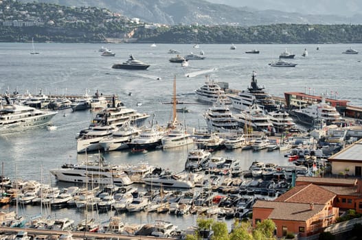 Monaco, Monte Carlo, 01 October 2022 - The famous motorboat exhibition at morning, mega yacht show, novelties of the boating industry. High quality photo