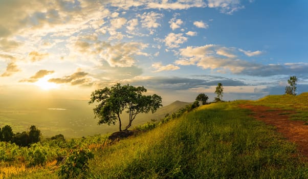 Mountain landscape with colorful vivid sunset on the cloudy sky,Sunset in nature with lighted clouds