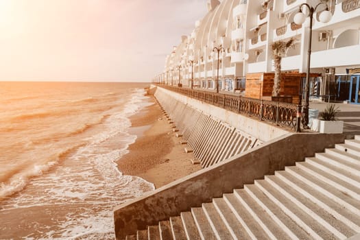 coastal area with apartment buildings of residential areas, modern hotel and restaurant complex on water and sandy beaches