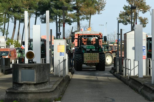 France, Bordeaux, 29 January 2024, Farmers' demonstration, blockade of the Langon toll plaza and snail mail operation on the A62 motorway. High quality 4k footage