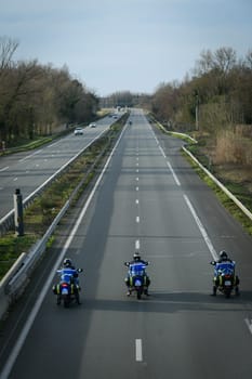 France, Bordeaux, 29 January 2024, Farmers' demonstration, mobile gendarmes on their motorbikes securing a demonstration by French farmers on a motorway in south-west France. High quality 4k footage