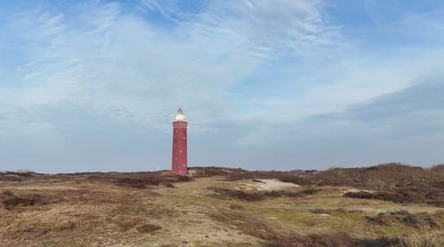 Drone picture of Ouddorp lighthouse in Holland with surrounding dunes in the netherlands