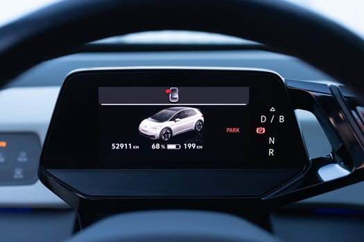 Electric Car Dashboard Charge display. Battery indicator fills up to 199 km from 0. Electric car battery indicator. Green energy in car industry. Electric car dashboard display.
