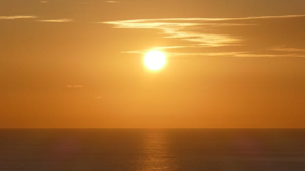 Sunset and reflections in the Cantabrian Sea, Basque Country.