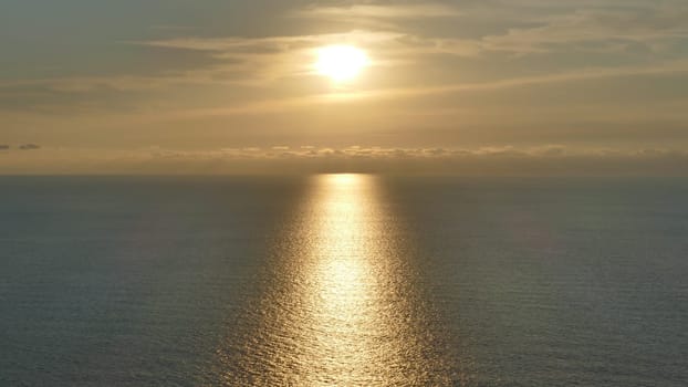 Sunset and reflections in the Cantabrian Sea, Basque Country.