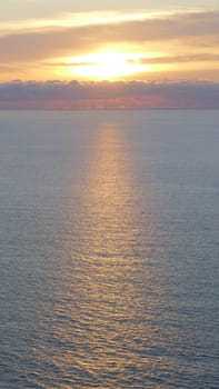 Sunset and reflections in the Cantabrian Sea, Basque Country.