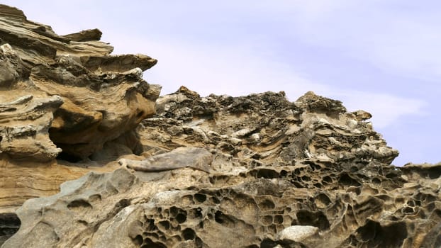 Rocks and limestone eroded on the coast of the sea