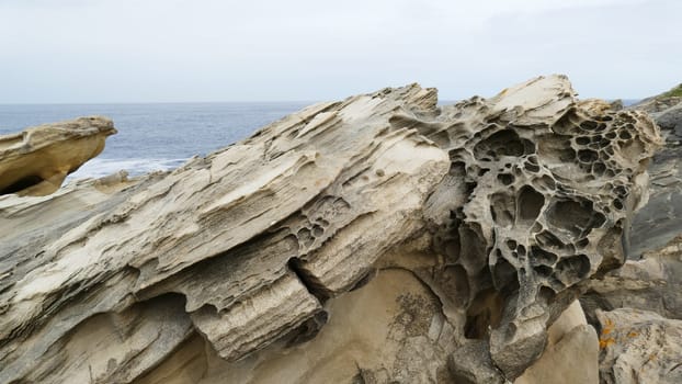 Rocks and limestone eroded on the coast of the sea