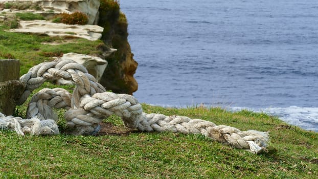 Boat mooring rope in a mountain on the coast of the Cantabrian Sea