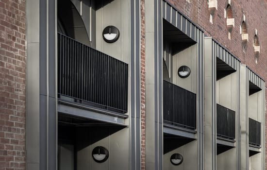 Edinburgh, Scotland - Jan 19, 2024 - Exterior architecture and modern designs view of new apartments, once the edinburgh tramway depot on Leith Walk as the Shrubhill Tramway Workshops and Power Station. The historic site, Space for text, Selective focus.