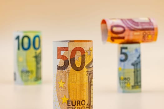 European EU banknotes with Euro currency as means of payment in Europe cut out from the background in the studio