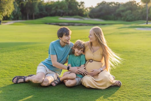 Joyful family time as a pregnant woman, her husband, and son share quality moments outdoors, embracing the beauty of nature and creating cherished memories together.