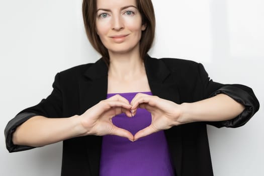 Inspire inclusion. Zoomers symbolize love. Woman finger heart dressed purple t-shirt. Hand showing heart. International Women's Day 2024 banner, InspireInclusion