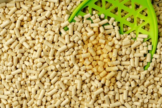 Wood pellets pet litter box filler close up photo