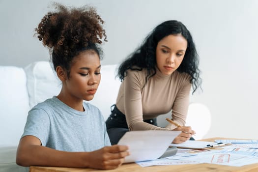 Stressed African American women has financial problems with credit card debt to pay crucial show concept of bad personal money and mortgage pay management crisis.