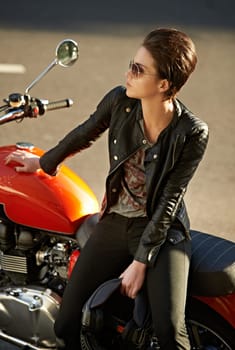 Motorcycle, thinking and woman in city with sunglasses for travel, transport or road trip as rebel. Fashion, leather and model with attitude on classic or vintage bike for transportation or journey.