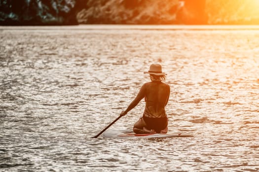 young woman in stylish bikini lying on seashore, closeup. Holiday, vacation and recreational concept.