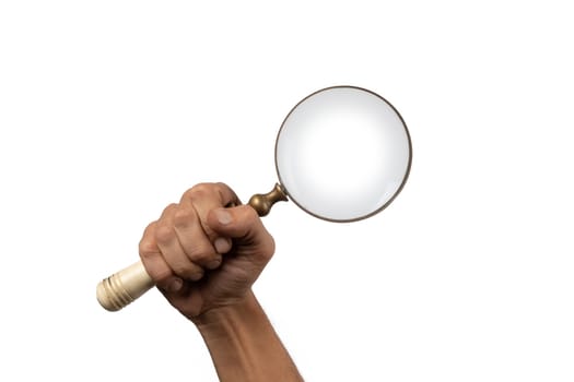 Black male hand holding a magnifying glass isolated on white. High quality photo