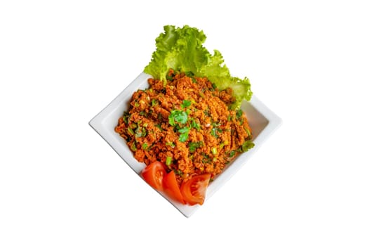 Turkish Bulgur Salad Kisir on white background. Traditional side dish in Turkish cuisine