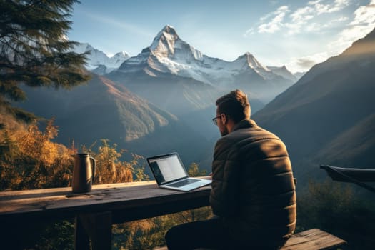 Digital nomad working on a laptop with a breathtaking mountain view. Generative AI.