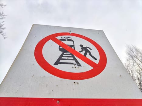 A sign not to walk on railway tracks. Railway Crossing Not Allowed or Walking on Railroad Prohibited. Russia