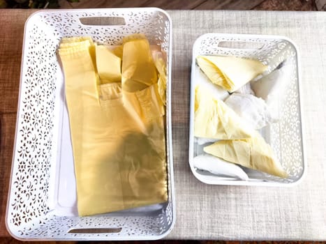 Plastic bag folded into triangle for storage. Ways of storing and laying at home