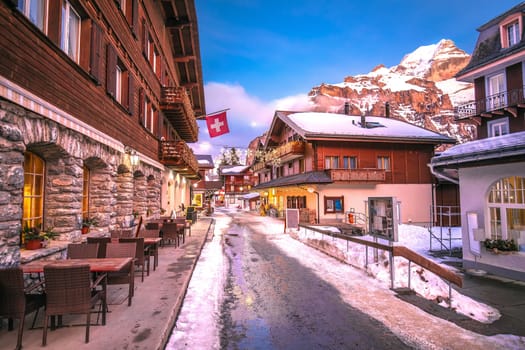 Idyllic Alpine village of Murren street sundown view, Berner Oberland region of Switzerland