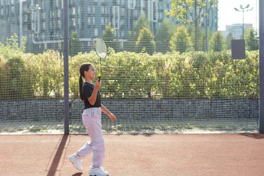 portrait of girl at the tennis court. High quality photo
