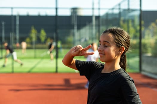 portrait of girl at the tennis court. High quality photo