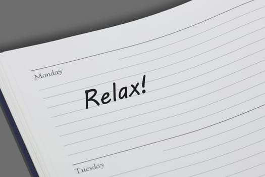 A Relax reminder message in an open diary