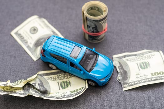 blue car model on dollar bills. High quality photo