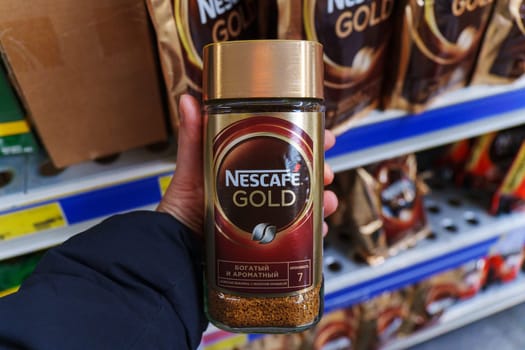 Tyumen, Russia-November 25, 2023: Glass packings of the Nescafe Gold instant coffee by Nestle corp.