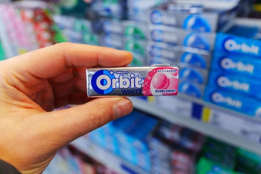 Tyumen, Russia-November 25, 2023: Orbit Peppermint chewing gum. Wrigley Company is founded in USA in 1891