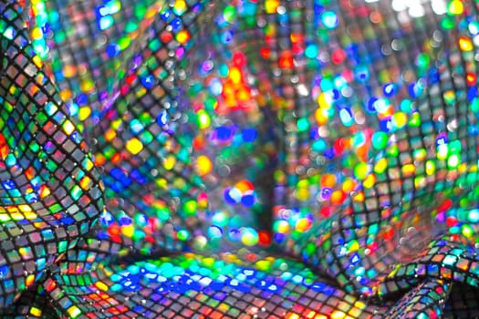 texture of colorful sequins with bokeh, clothing items