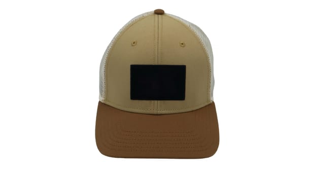 Basic baseball cap with mesh isolated on white background. Summer headdress in white, brown and beige. Mockup for your design, branding. A fashionable accessory with a large visor. Front view