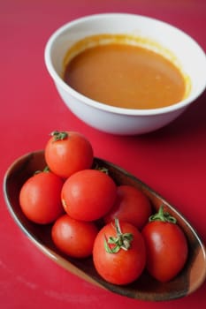 fresh tomato soup on table .