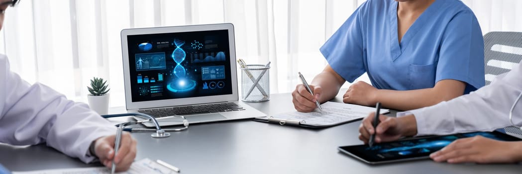 Group of doctor or researcher studying genetic disease in DNA with laptop, analyze genetic data, formulate medical treatment strategies, and develop healthcare plan with innovative solution. Neoteric
