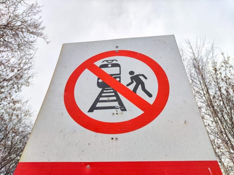 A sign not to walk on railway tracks. Railway Crossing Not Allowed or Walking on Railroad Prohibited. Russia
