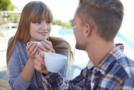 Couple, morning and drinking coffee on vacation and love in outdoors, romance and hot tea on holiday. People, bonding and peaceful or relaxation, commitment and loyalty to marriage or relationship.