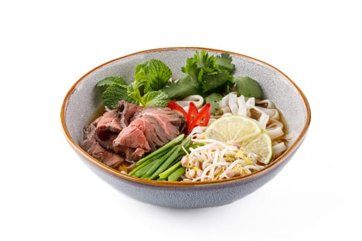Pho bo soup on a white background studio shooting