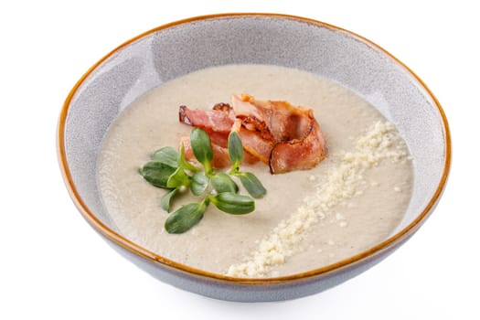 Cream of mushroom soup with bacon on a white background studio food photo 2