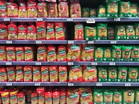 FRANCE, BORDEAUX, February, 2, 2024: Pasta packing on a shelf in a supermarket. is suitable for presenting new packaging among many others. High quality photo