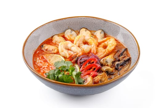 Tom Yam with seafood on a white background studio food photo 1