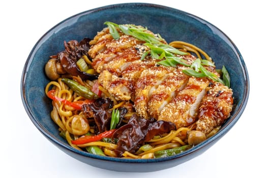Udon with chicken schnitzel on a white background studio shooting